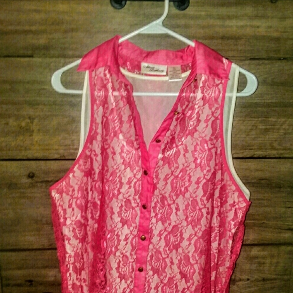 Sheer tank top and lace over shirt.